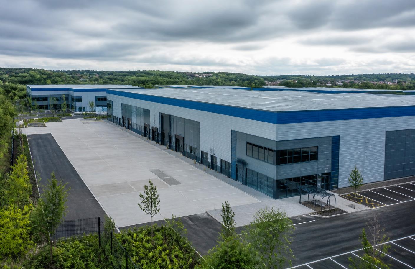Modern industrial estate with commercial units and loading bays